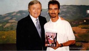 Talk show legend Mike Douglas is pictured with Stephen K. Peeples, writer of the book accompanying Rhino Home Video's "John Lennon & Yoko Ono on The Mike Douglas Show' VHS boxed set, released in May 1998. Mike Douglas and Stephen K. Peeples