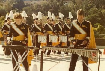 Percussion players Val Pryor and Rod Bennett drive the UCLA Marching Band, 1985.