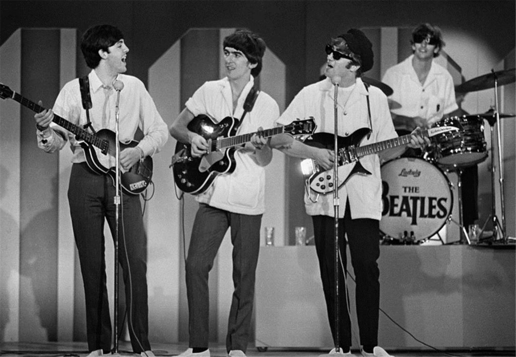 The Beatles - Paul McCartney, George Harrison, John Lennon and Ringo Starr - rehearse at the Deauville Hotel on Miami Beach for their second appearance on "The Ed Sullivan Show," February 16, 1964. Photo: (c) Charlie Trainor/Morrison Hotel Gallery. Used by permission.