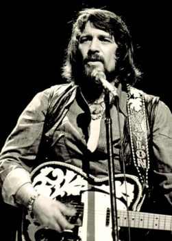 Waylon Jennings in concert, 1976. Photo by Todd Everett.