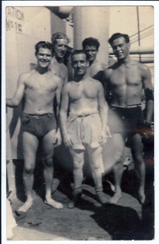 Alf Lennon (center) and shipmates at sea.
