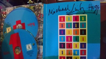 Beatles 1+ signed by Michael Lindsay Hogg