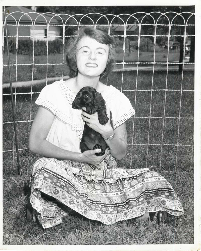 Joan Ruth Sullivan, age 17, and Pepper, her cocker spaniel, Neenah, Wisconsin, 1946.