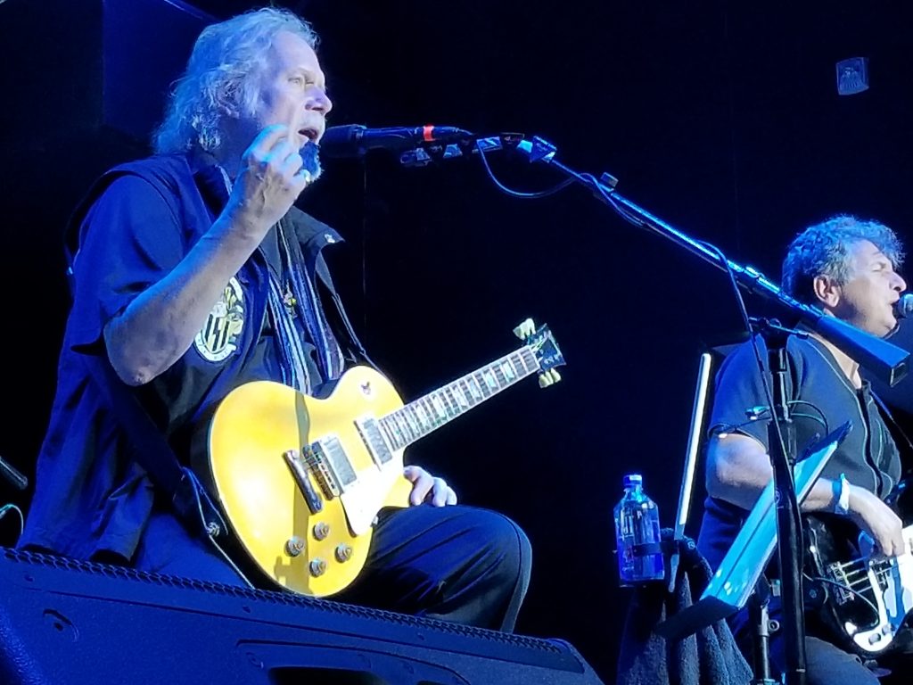 Randy Bachman tells the story behind one of his classics onstage at the Canyon Santa Clarita, July 22, 2018. Photo: Stephen K. Peeples.